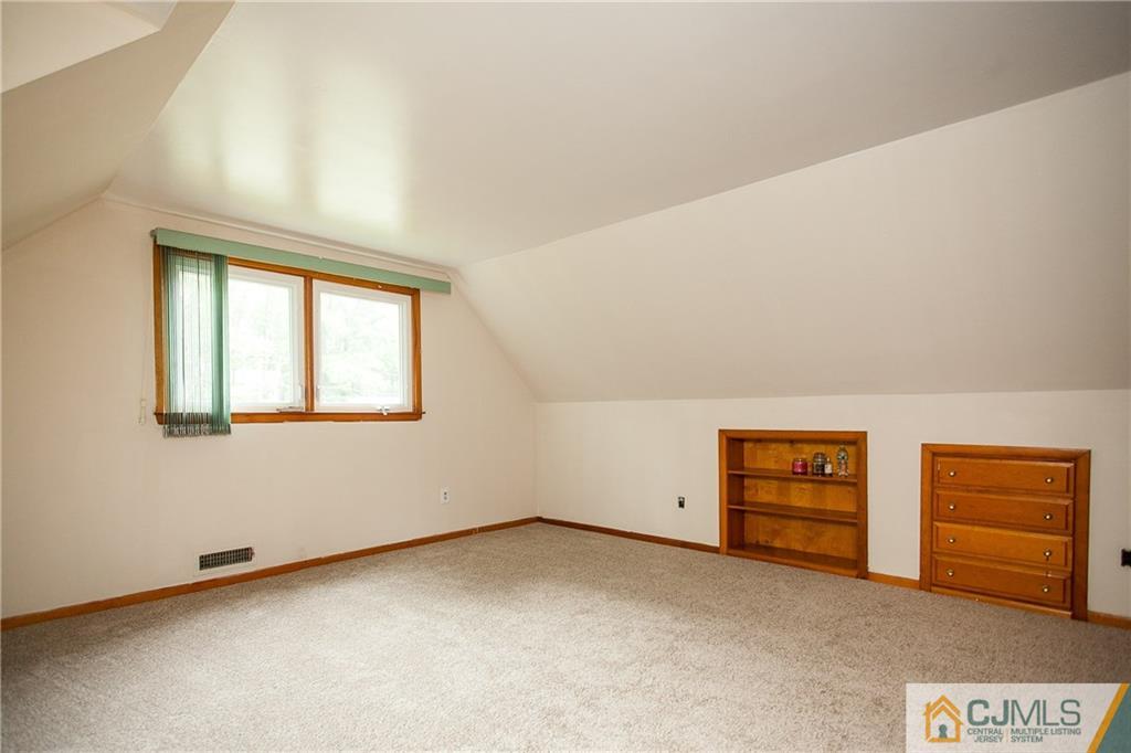 91 George Avenue Edison, NJ 08820 - Photo 15 of 21 an empty room with windows