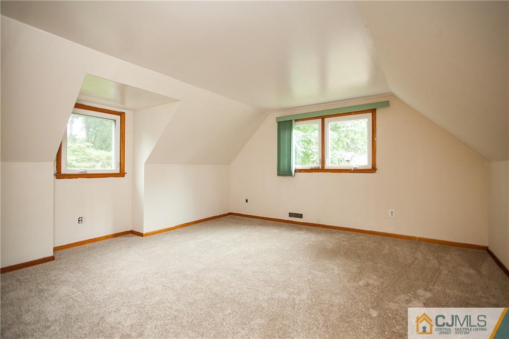 91 George Avenue Edison, NJ 08820 - Photo 16 of 21 an empty room with windows