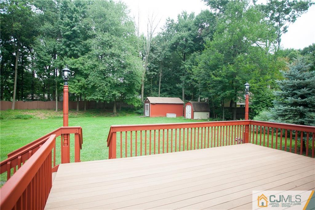 91 George Avenue Edison, NJ 08820 - Photo 19 of 21 a terrace view with a garden