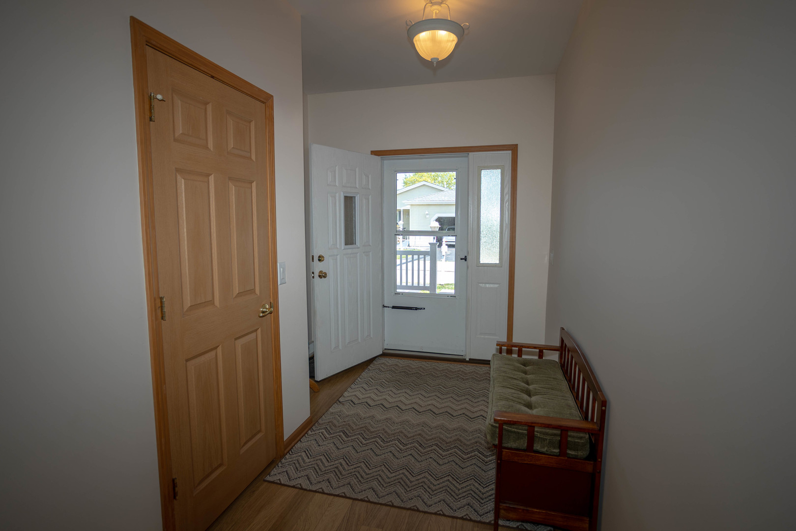 212 Rodeo Drive, Unit 2179 Grayslake, IL 60030 - Photo 27 of 31 a room that has a bed and a window in it