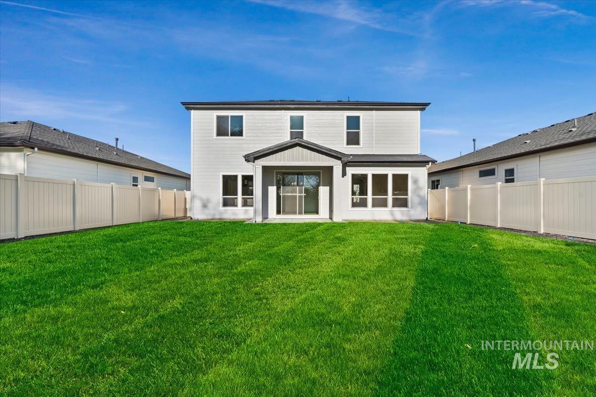 4223 Tropic Way Caldwell, ID 83607 - Photo 37 of 42 Expansive green lawn with a vinyl privacy fence