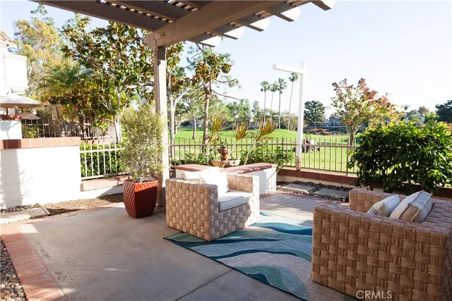 a outdoor living space with patio furniture and garden