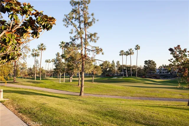 a view of a swimming pool and an outdoor space