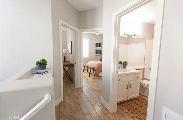a hallway with view of living room and furniture