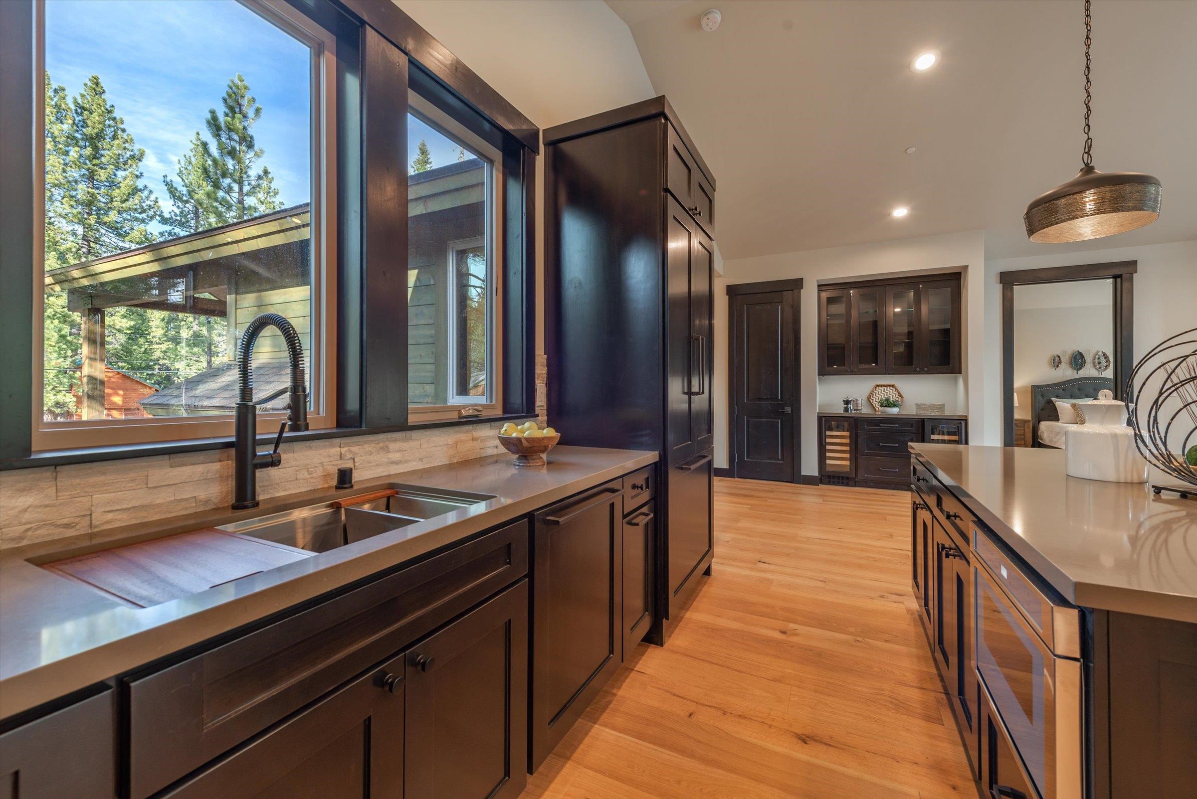 13510 Ski View Loop Truckee, CA 96161 - Photo 12 of 20 a kitchen with stainless steel appliances a sink stove and cabinets