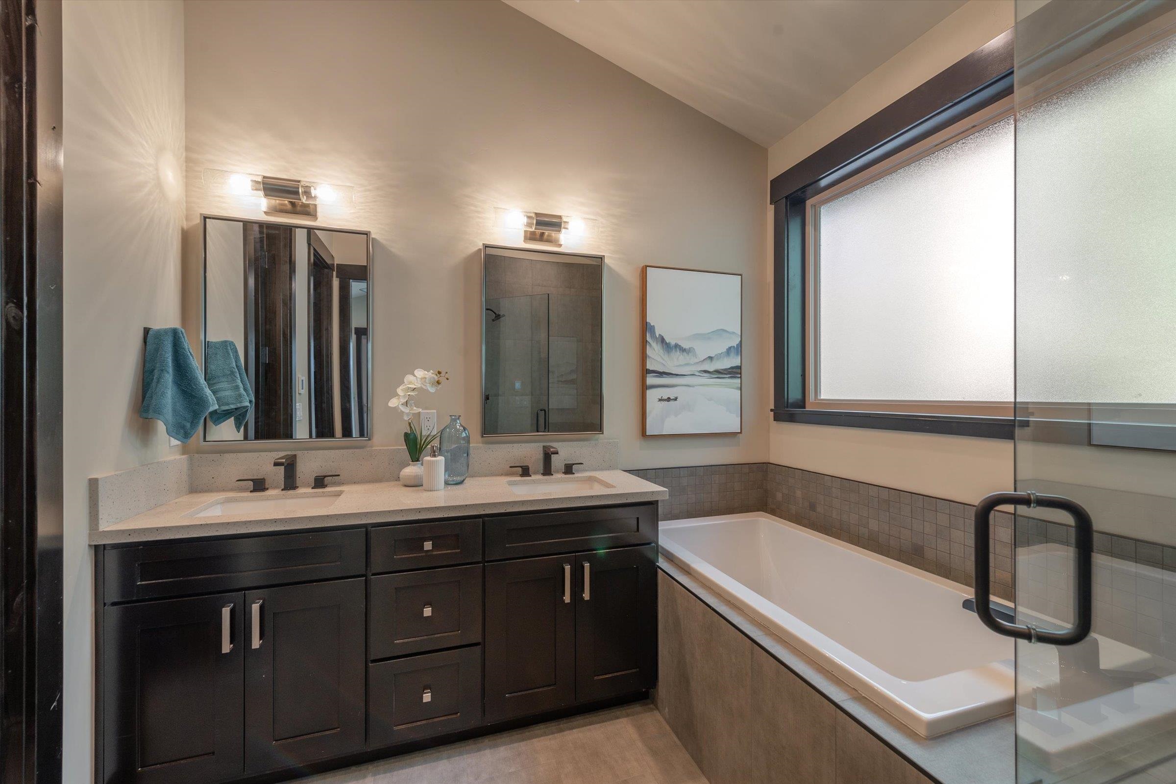 13510 Ski View Loop Truckee, CA 96161 - Photo 16 of 20 a bathroom with a double vanity sink and mirror