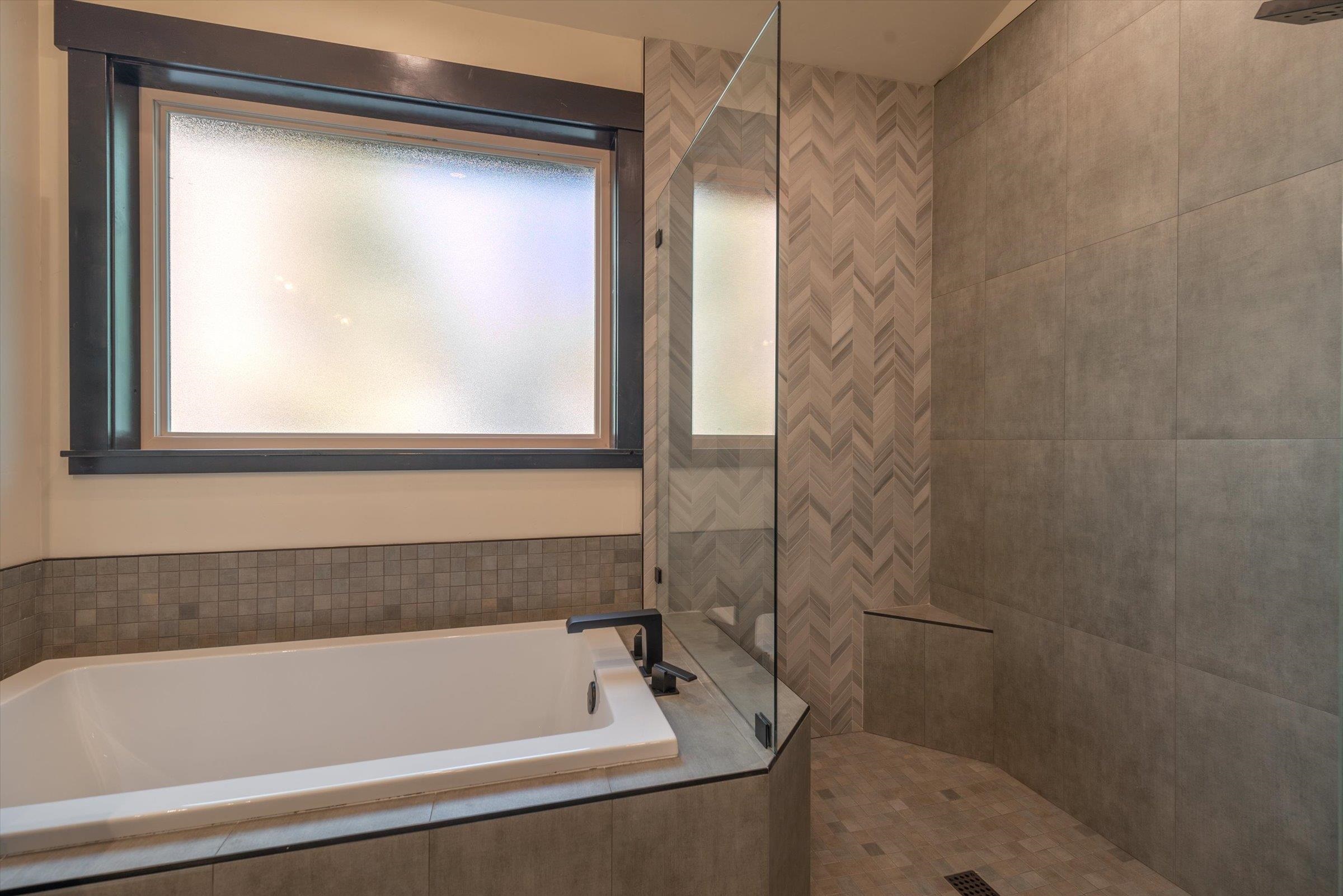 13510 Ski View Loop Truckee, CA 96161 - Photo 18 of 20 a bathroom with a bathtub and a shower