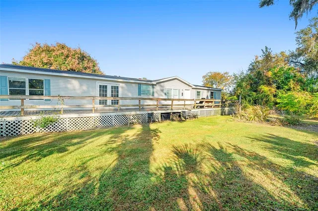 a view of a house with a swimming pool