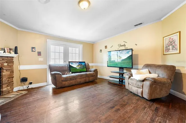 a view of an entryway with furniture and livingroom view
