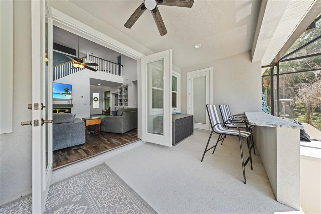 16948 Deer Island Road Tavares, FL 32778 - Photo 46 of 67 a view of a livingroom with furniture and a window