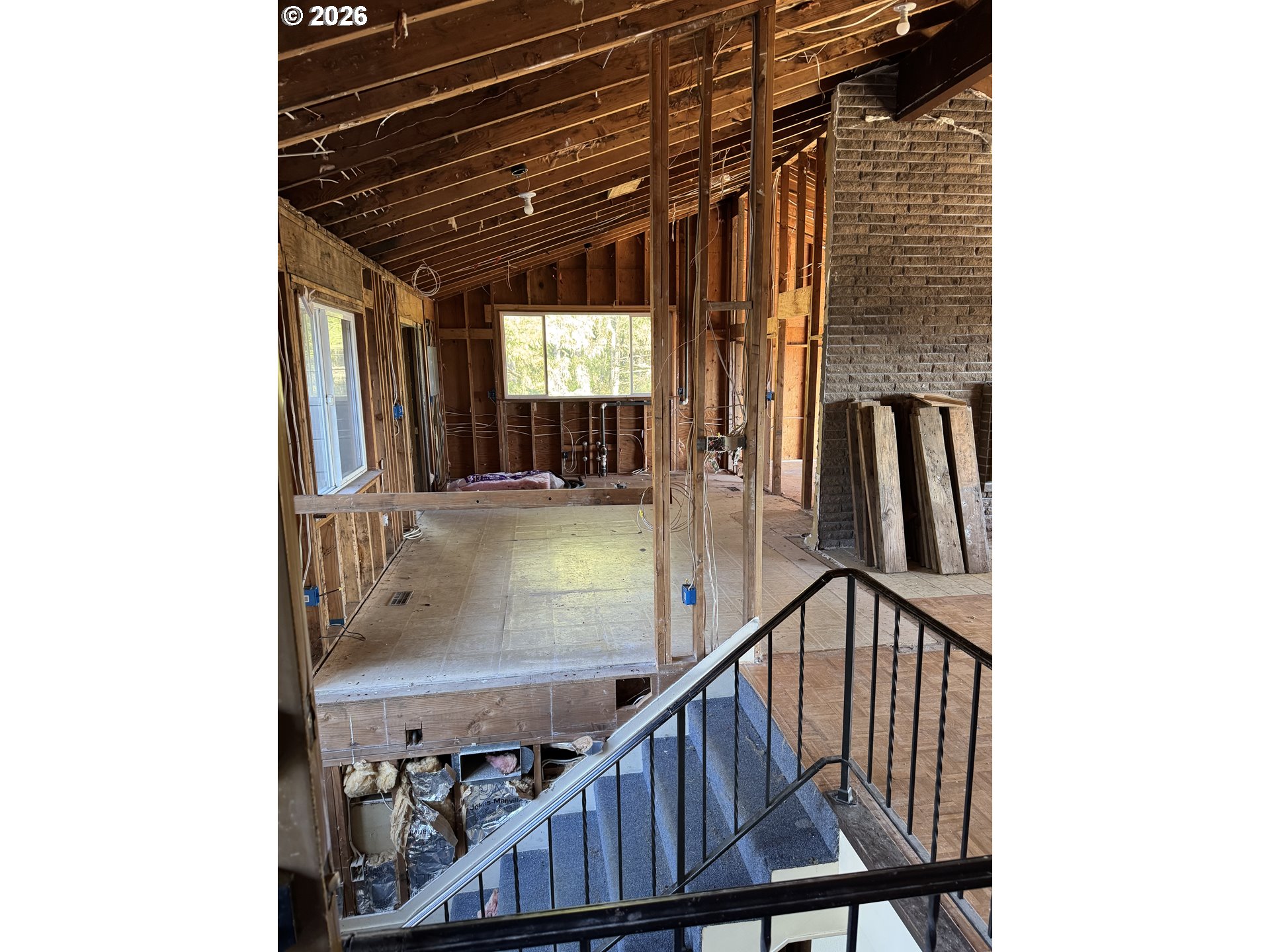 19105 Rock Creek Road Sheridan, OR 97378 - Photo 19 of 27 a view of staircase with black and white walls