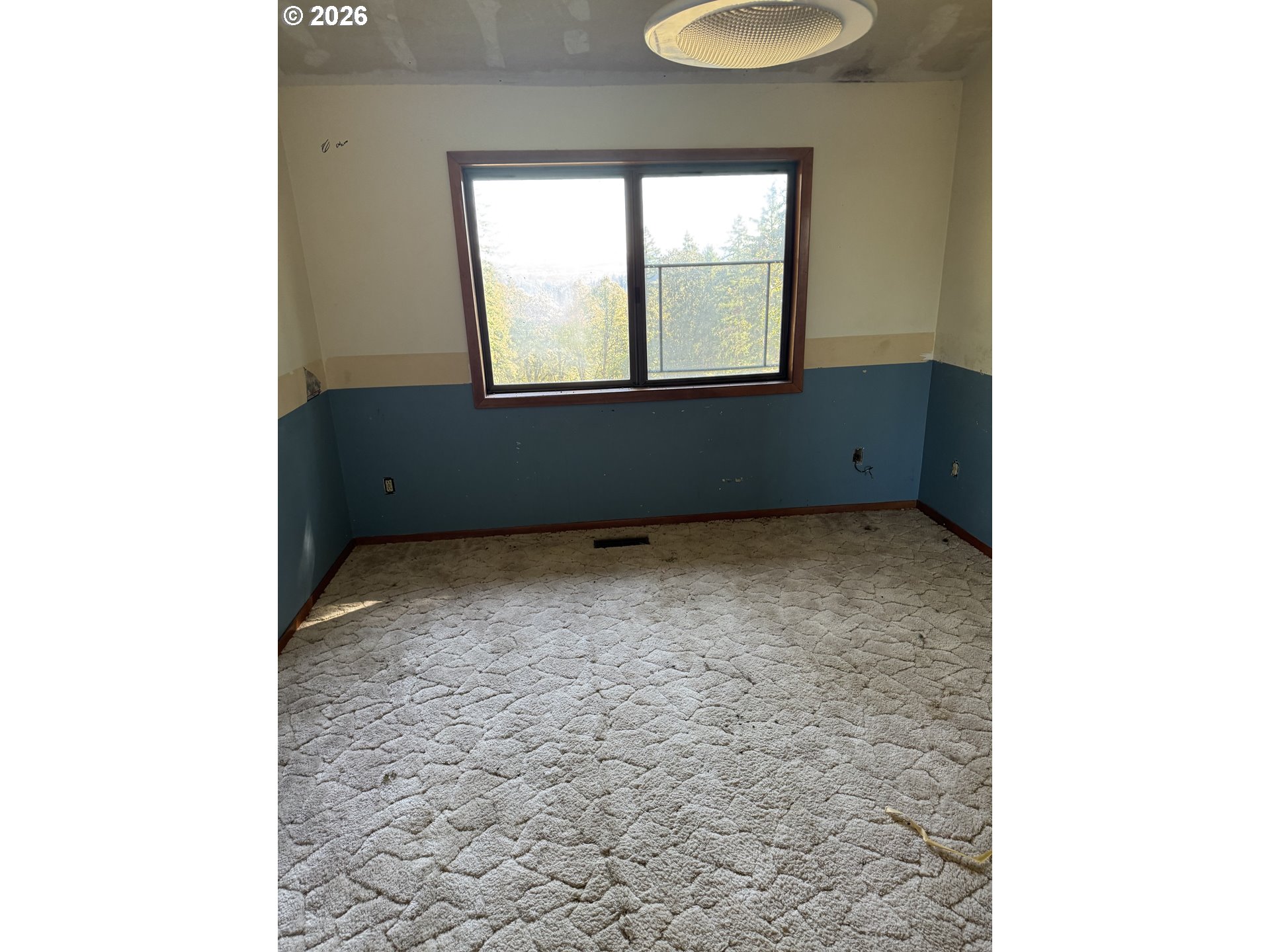19105 Rock Creek Road Sheridan, OR 97378 - Photo 20 of 27 a view of an empty room with a window