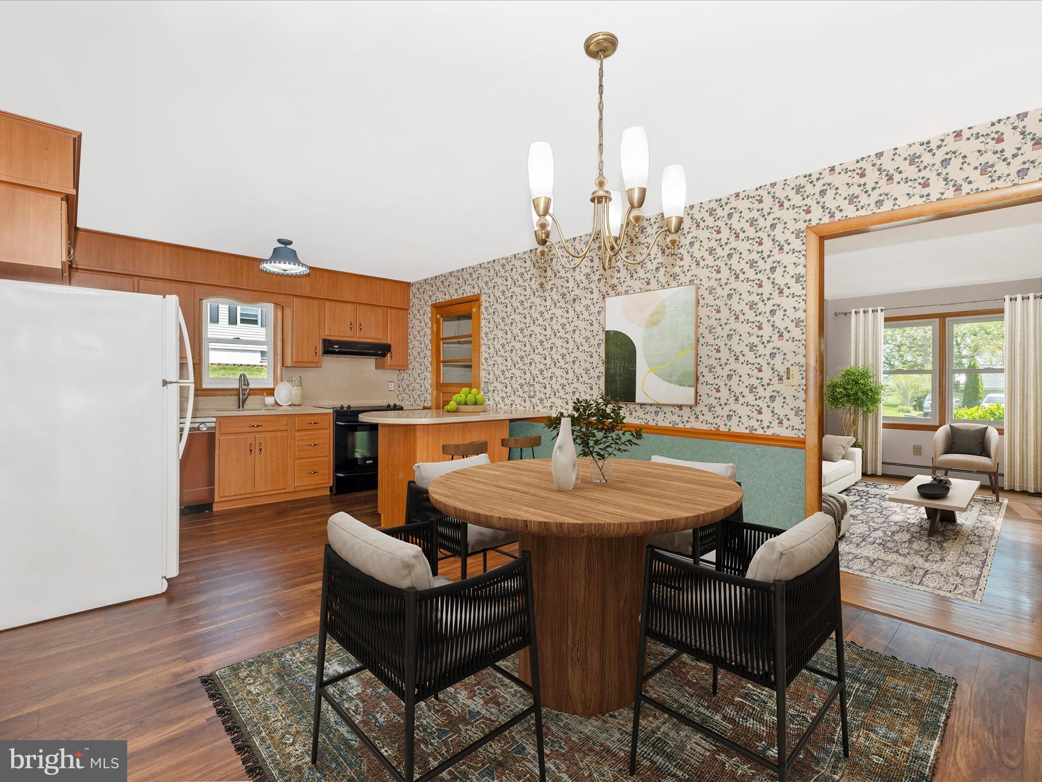 9203 Oak Tree Circle Frederick, MD 21701 - Photo 18 of 49 a view of a dining room with furniture and wooden floor