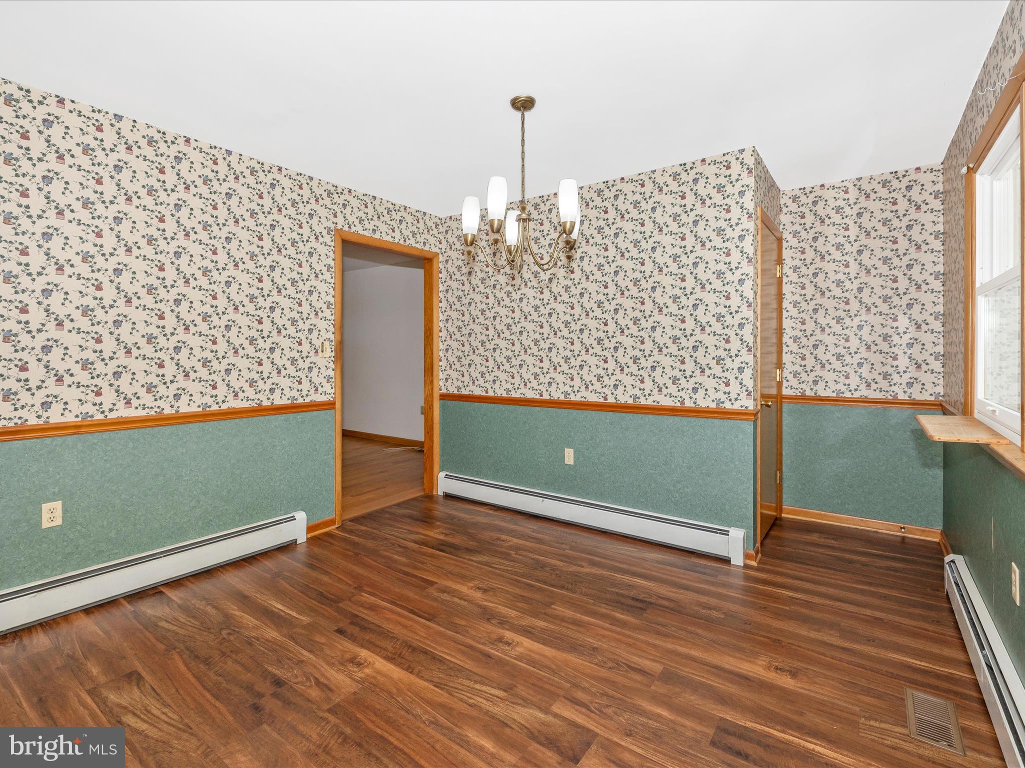 9203 Oak Tree Circle Frederick, MD 21701 - Photo 20 of 49 a view of a room with wooden floor