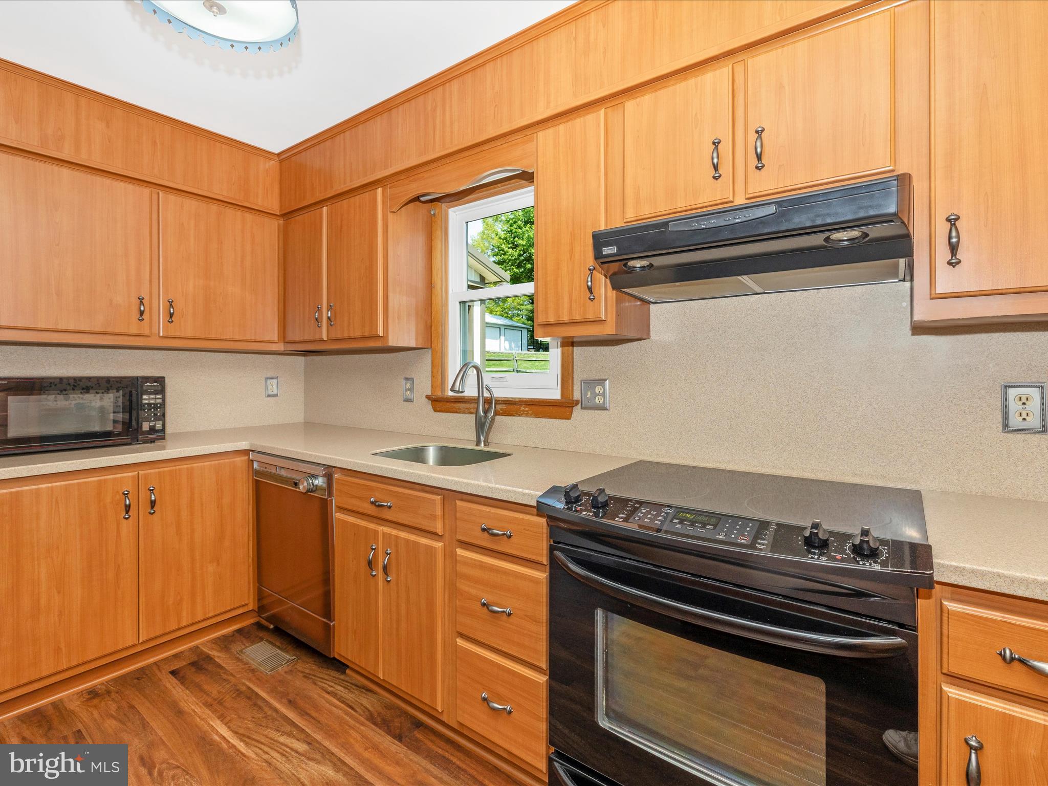 9203 Oak Tree Circle Frederick, MD 21701 - Photo 23 of 49 a kitchen with a stove and a sink