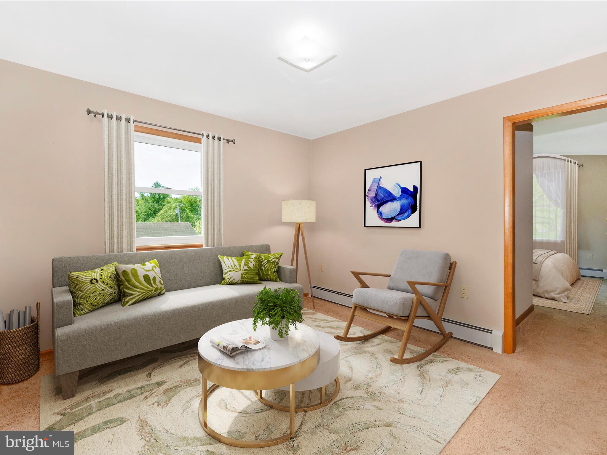 9203 Oak Tree Circle Frederick, MD 21701 - Photo 26 of 49 a living room with furniture and a large window