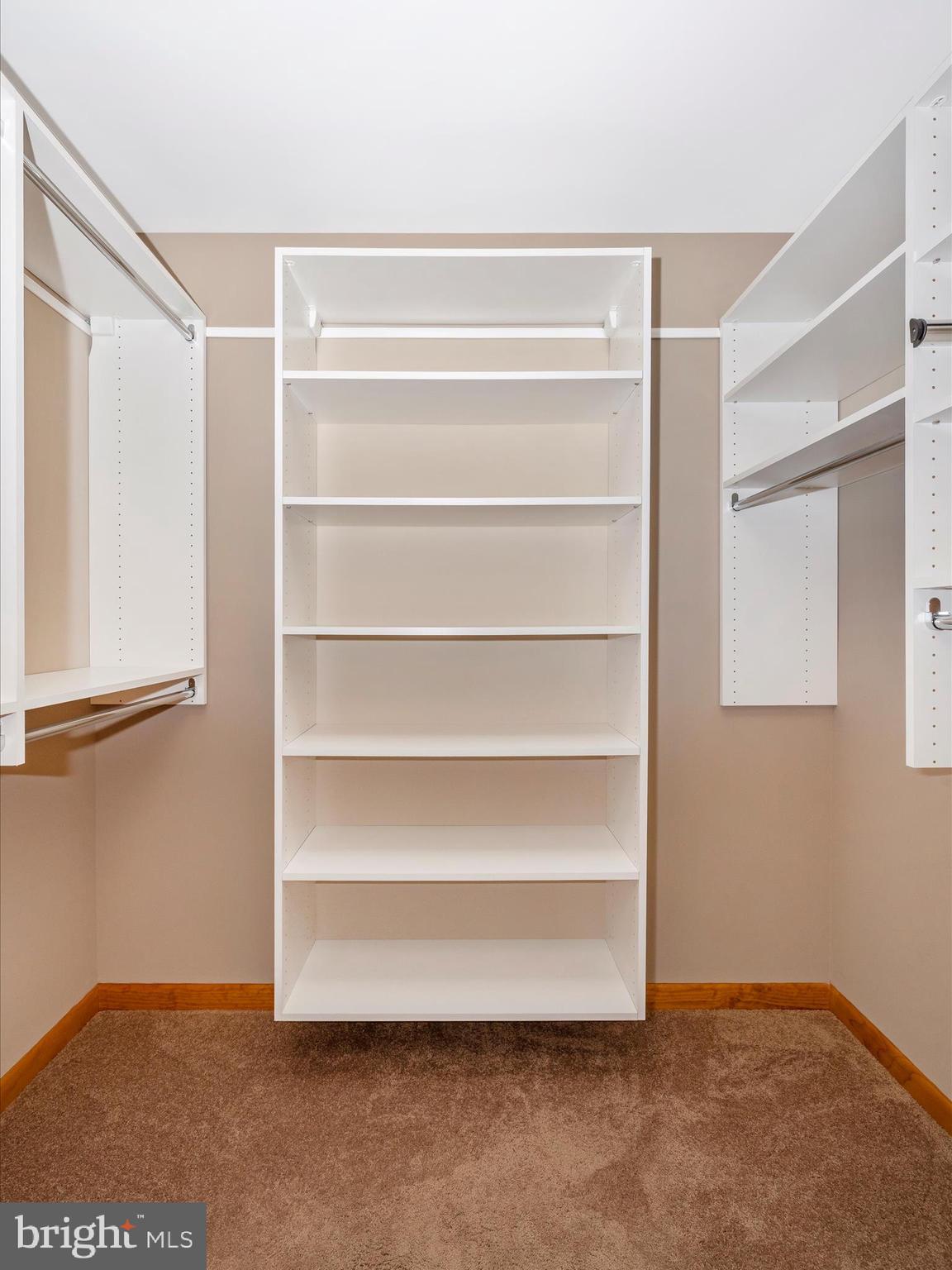 9203 Oak Tree Circle Frederick, MD 21701 - Photo 34 of 49 a view of walk in closet with empty racks