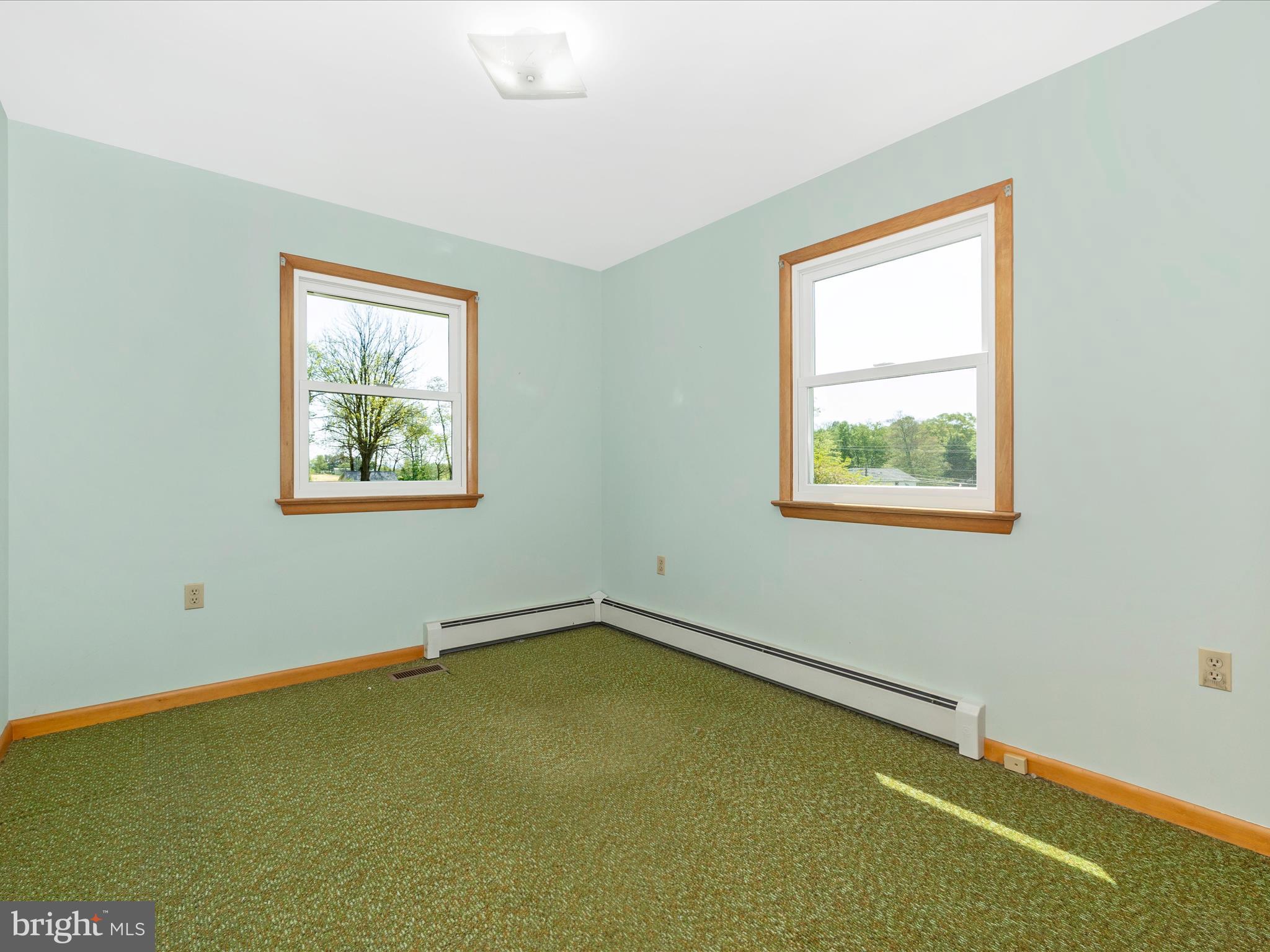 9203 Oak Tree Circle Frederick, MD 21701 - Photo 36 of 49 a view of room with window and wooden floor
