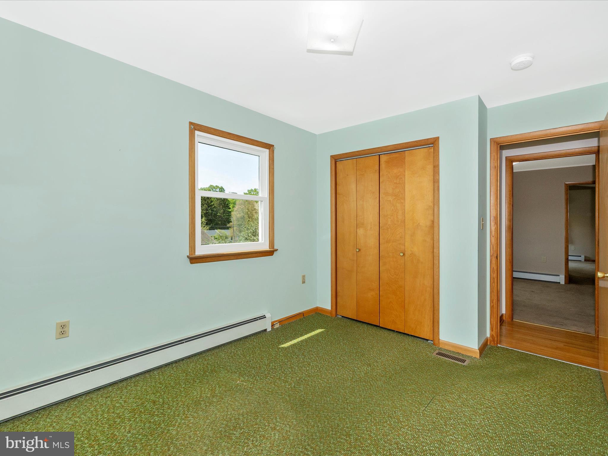9203 Oak Tree Circle Frederick, MD 21701 - Photo 37 of 49 a view of an empty room with closet and a window