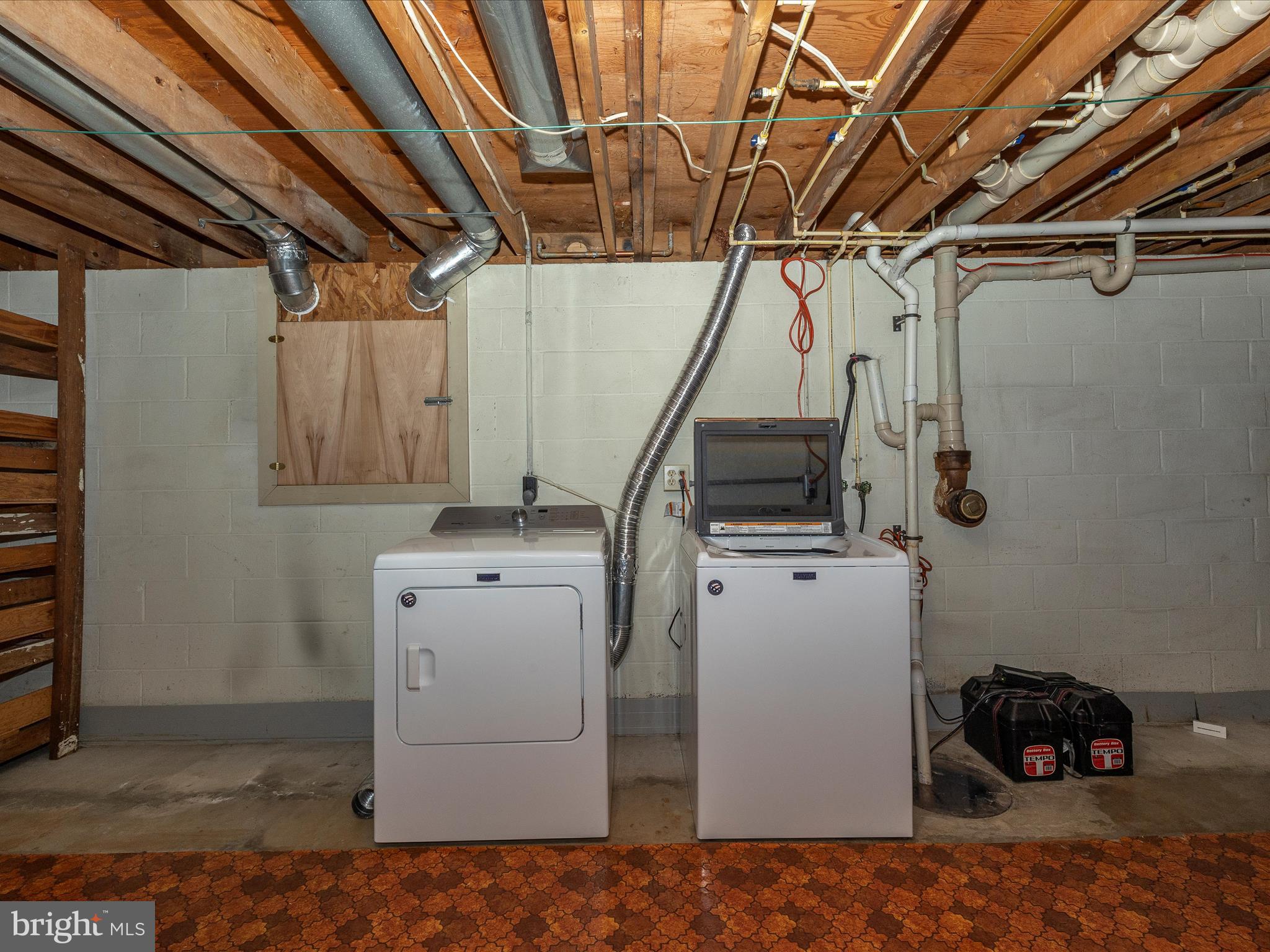 9203 Oak Tree Circle Frederick, MD 21701 - Photo 47 of 49 a view of a storage & utility room with a sink