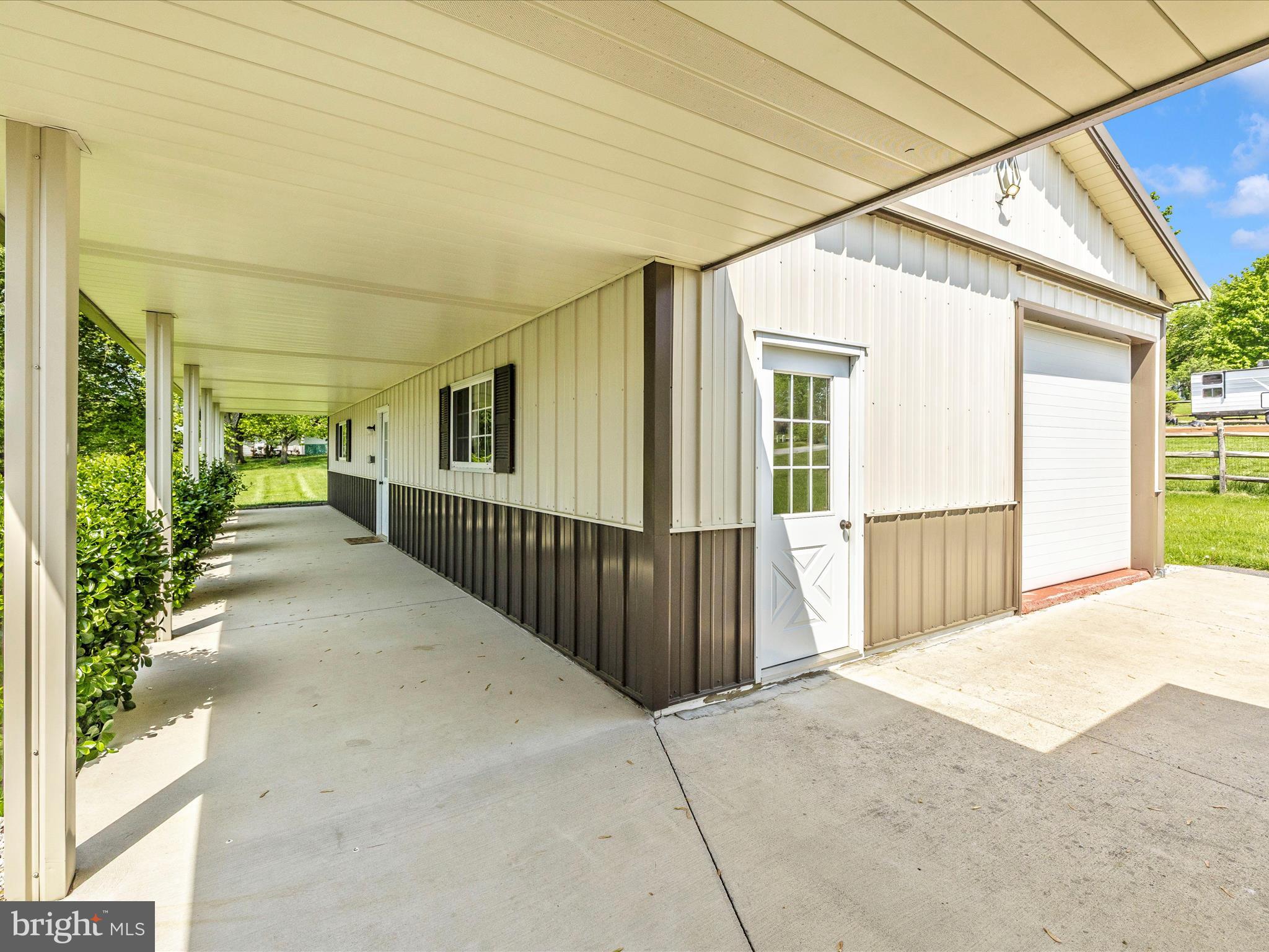 9203 Oak Tree Circle Frederick, MD 21701 - Photo 6 of 49 a view of a house with wooden fence