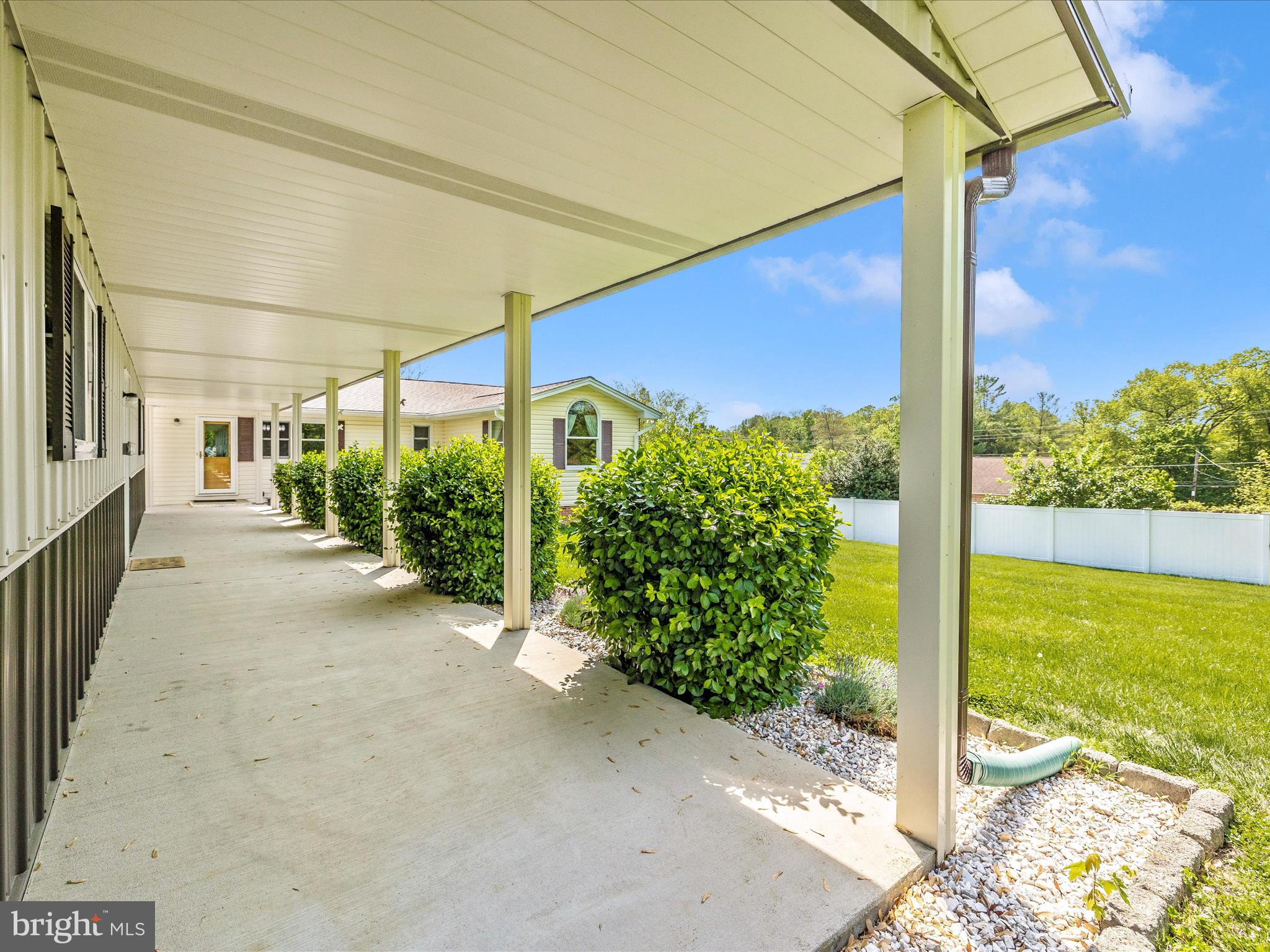 9203 Oak Tree Circle Frederick, MD 21701 - Photo 7 of 49 a view of a street with an tree