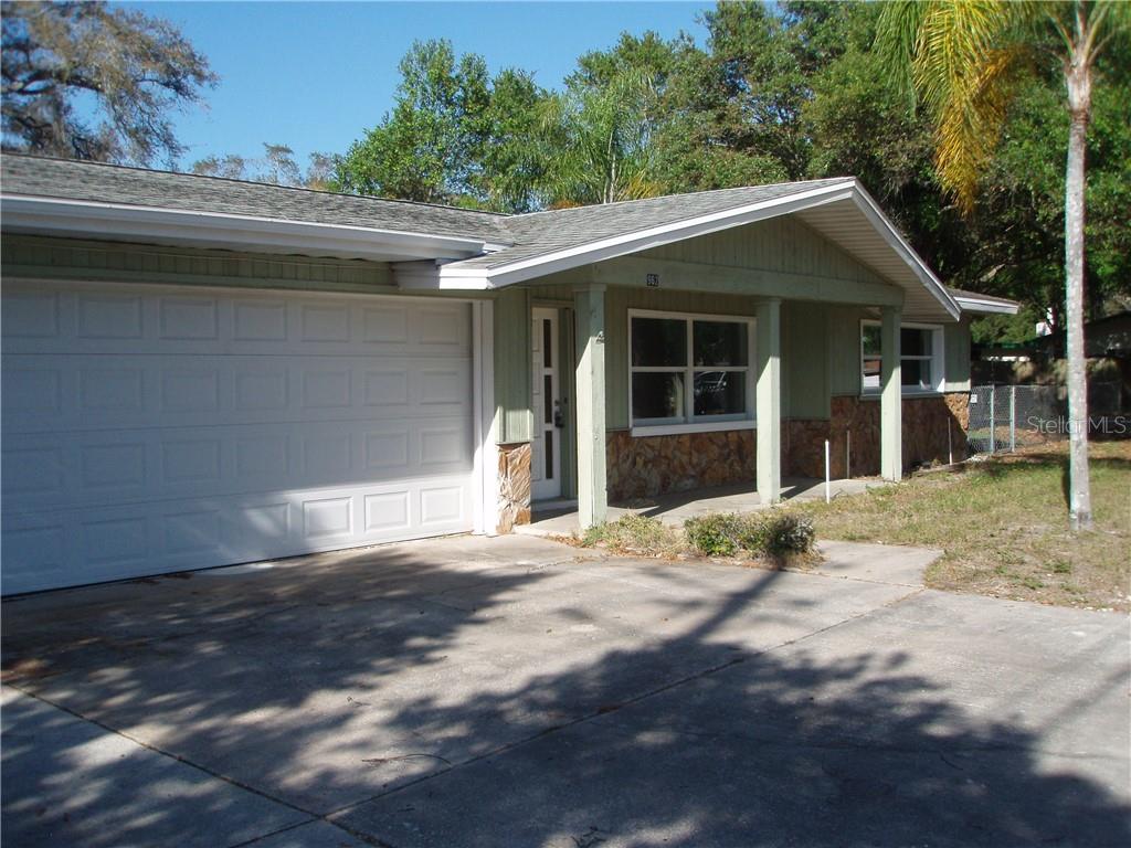962 Union Street Dunedin, FL 34698 - Photo 1 of 1 a view of a house with a yard