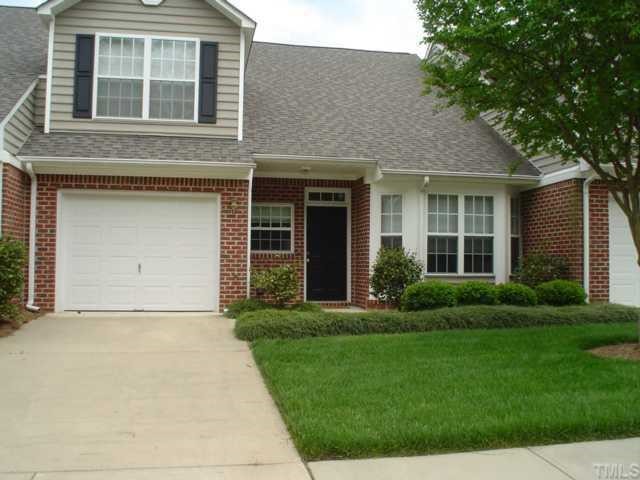 8714 Compass Lane Raleigh, NC 27615 - Photo 1 of 12 All Brick Townhome with 3 Bedrooms and 2.5 Baths and 1-Car Garage. Perfect Location in Community _ Best Location on the Street. View from Inside the Home Looks Out to an Open Greenway Area.