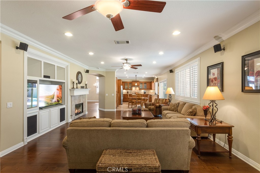 33351 Nicholas Common Temecula, CA 92592 - Photo 16 of 42 a living room with furniture and a kitchen