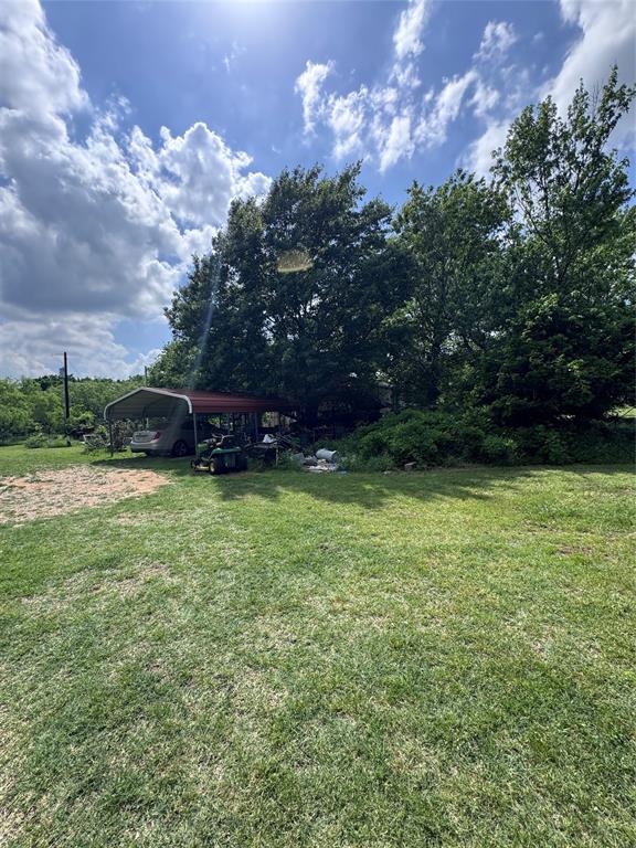 806 Old Base Road Aurora, TX 76078 - Photo 8 of 23 a view of a backyard