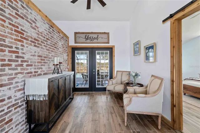 a spacious bedroom with a bed and window