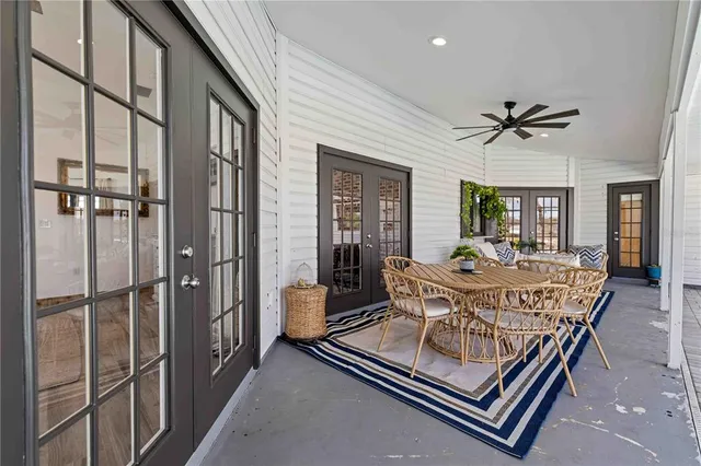 a view of a swimming pool with a patio