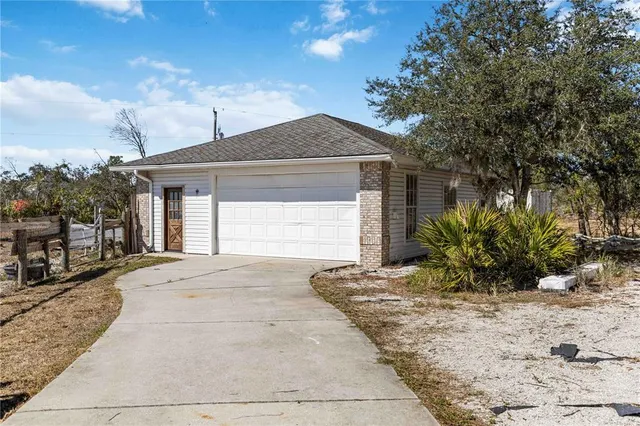 a vase of flowers sitting on a table