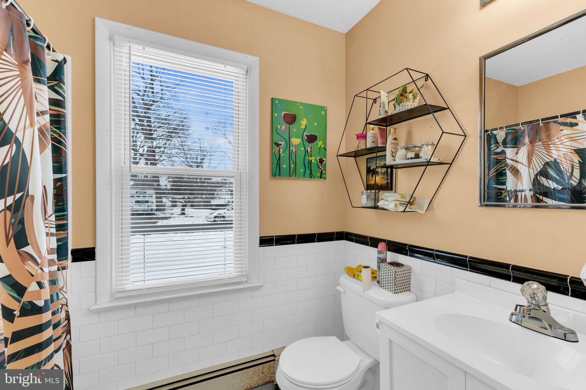 463 Ensign Road Forked River, NJ 08731 - Photo 12 of 21 a bathroom with a sink and a mirror