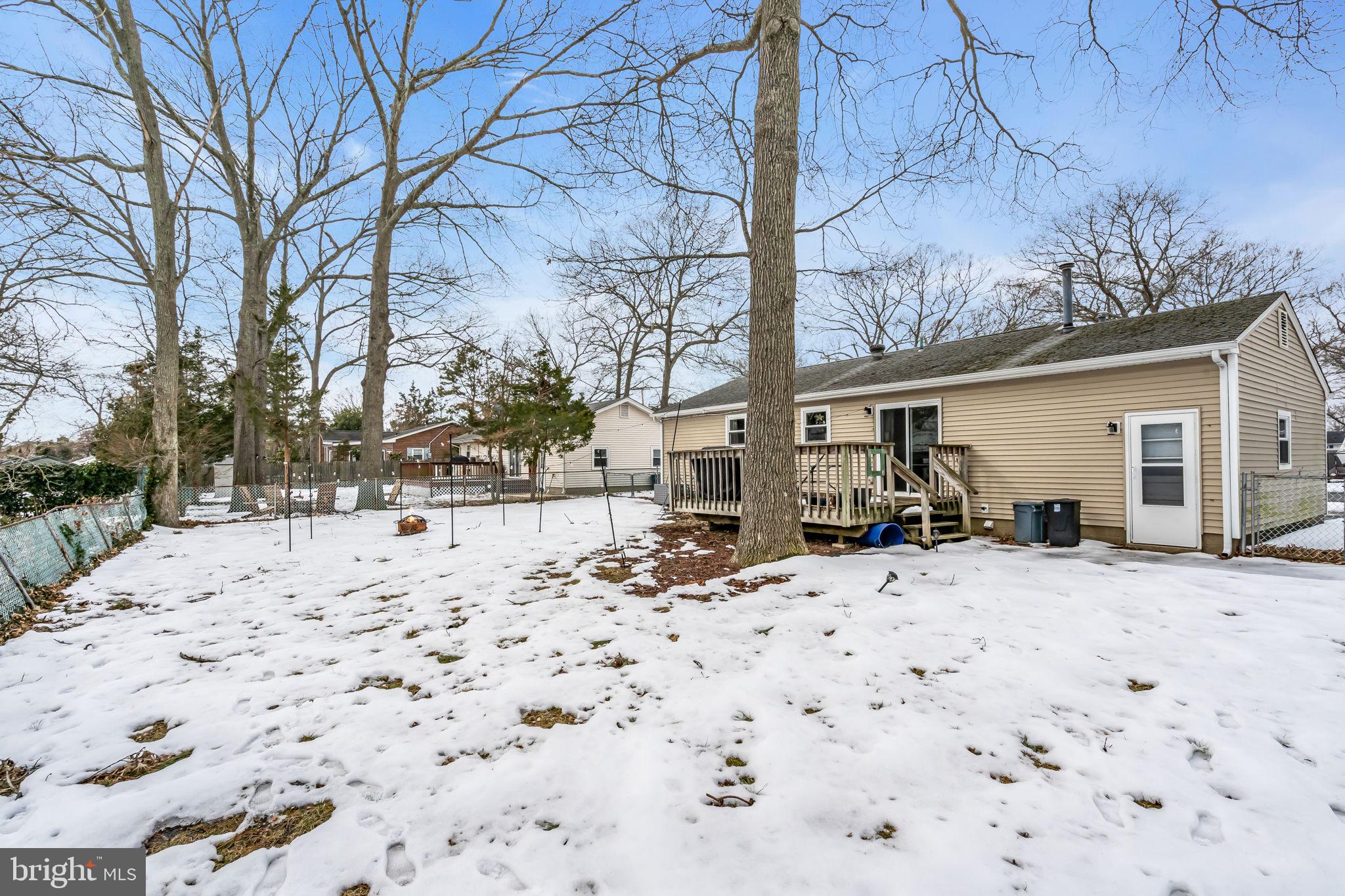 463 Ensign Road Forked River, NJ 08731 - Photo 20 of 21 a view of a house covered in snow