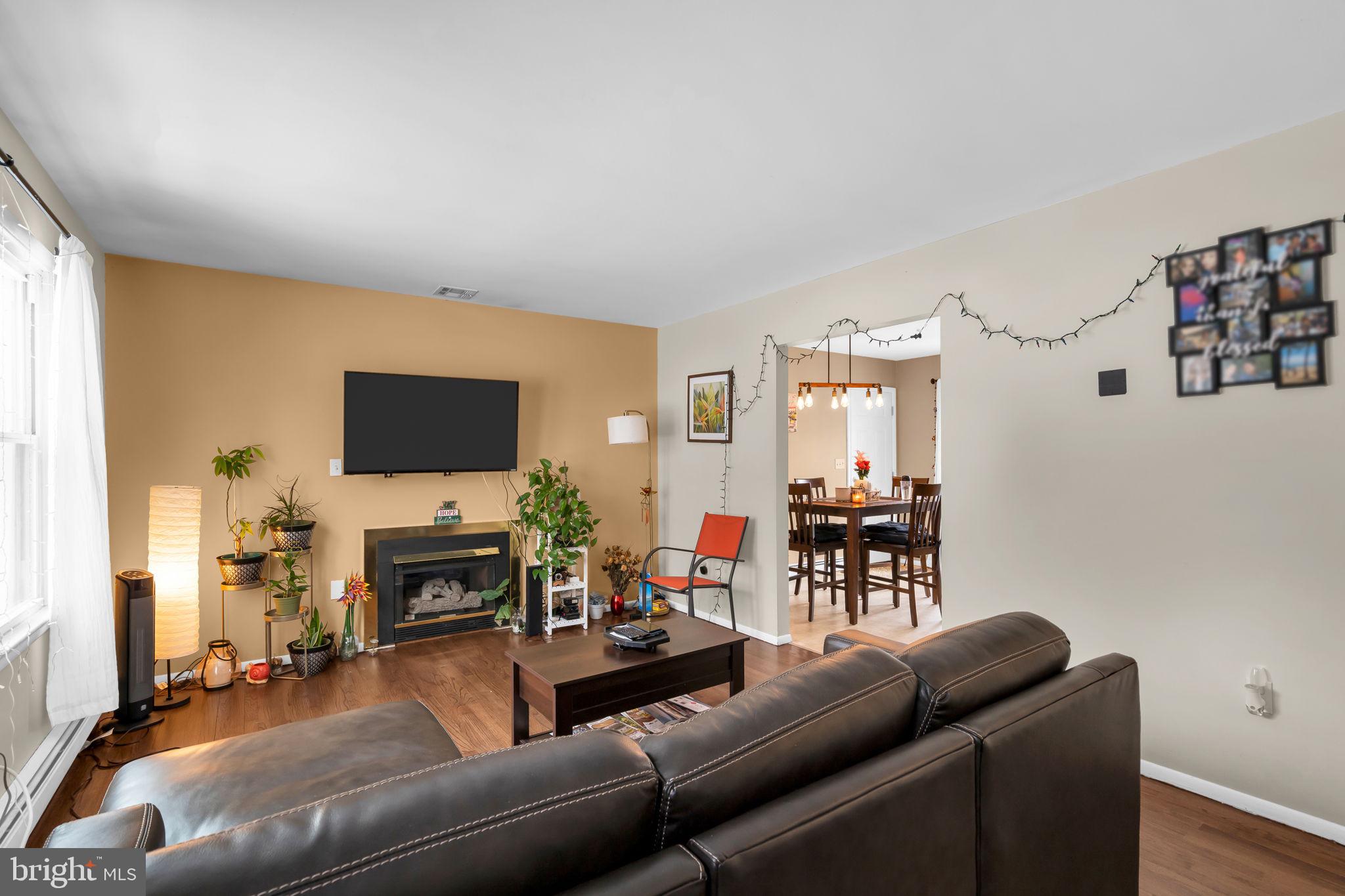 463 Ensign Road Forked River, NJ 08731 - Photo 6 of 21 a living room with furniture and a flat screen tv