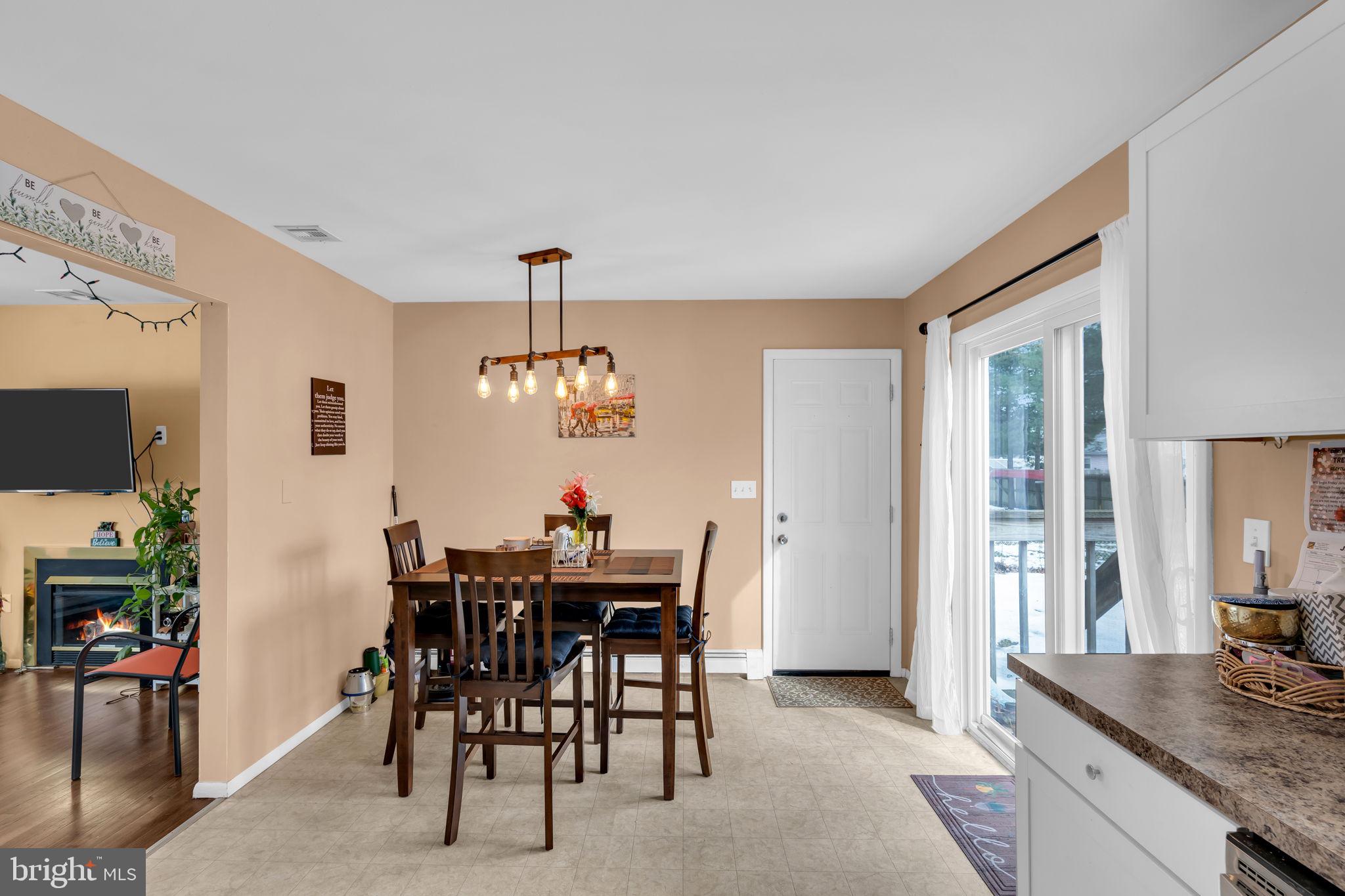 463 Ensign Road Forked River, NJ 08731 - Photo 9 of 21 a view of a dining room with furniture