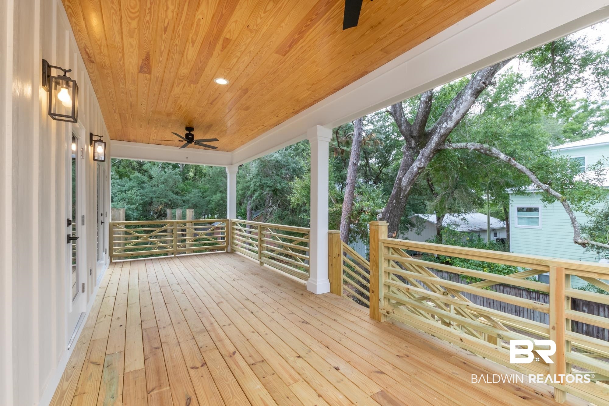 5303 Pine Road Orange Beach, AL 36561 - Photo 2 of 45 back porch
