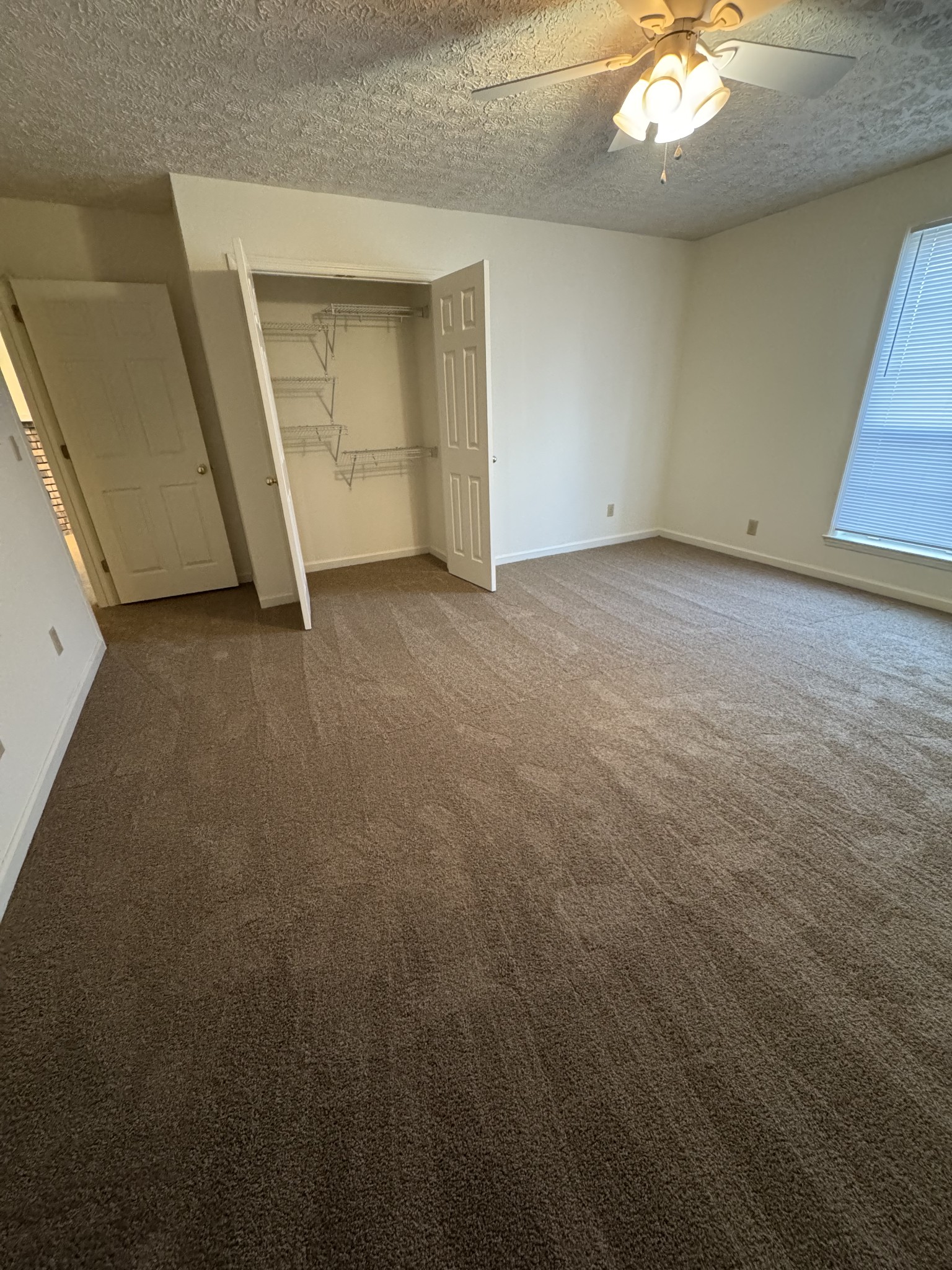 1714 Monument Lane, Unit B Lebanon, TN 37087 - Photo 5 of 9 an empty room with a fireplace