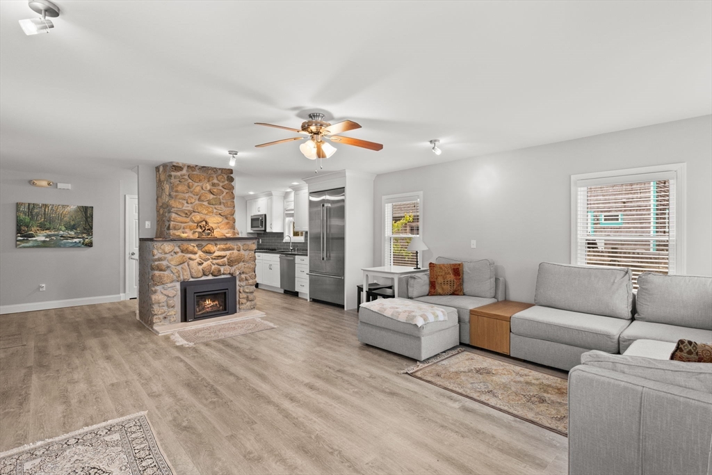 106 Circuit Avenue Wareham, MA 02571 - Photo 13 of 34 a living room with furniture and a fireplace