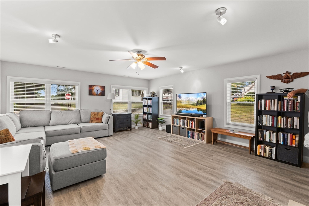 106 Circuit Avenue Wareham, MA 02571 - Photo 16 of 34 a living room with furniture and a wooden floor