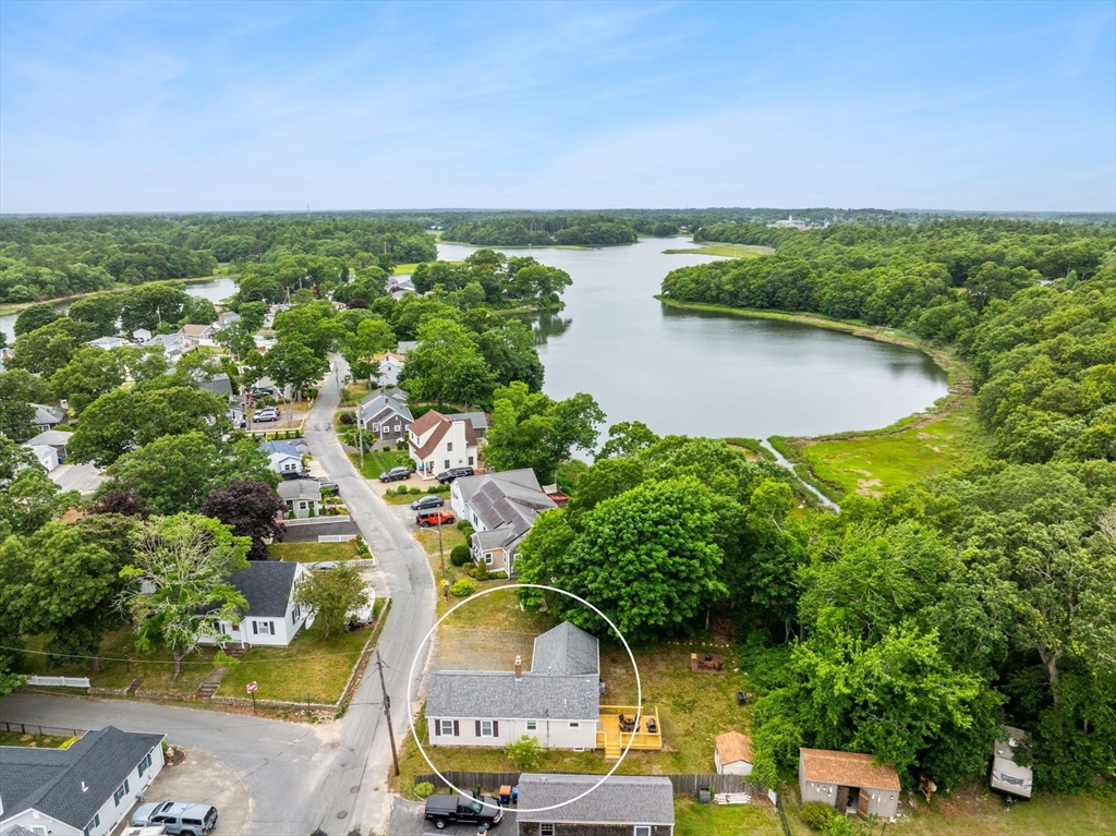 106 Circuit Avenue Wareham, MA 02571 - Photo 29 of 34 an aerial view of residential house with outdoor space and trees all around