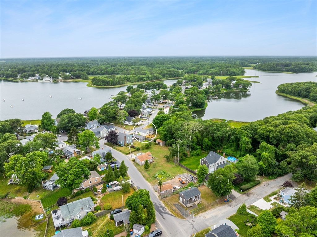 106 Circuit Avenue Wareham, MA 02571 - Photo 30 of 34 an aerial view of green landscape with trees houses and lake view