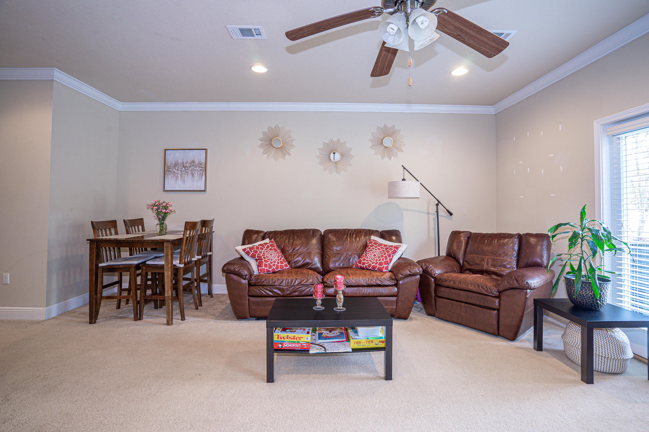 19 East Shady Oaks Lane, Unit B Santa Rosa Beach, FL 32459 - Photo 15 of 35 a living room with furniture and a chandelier