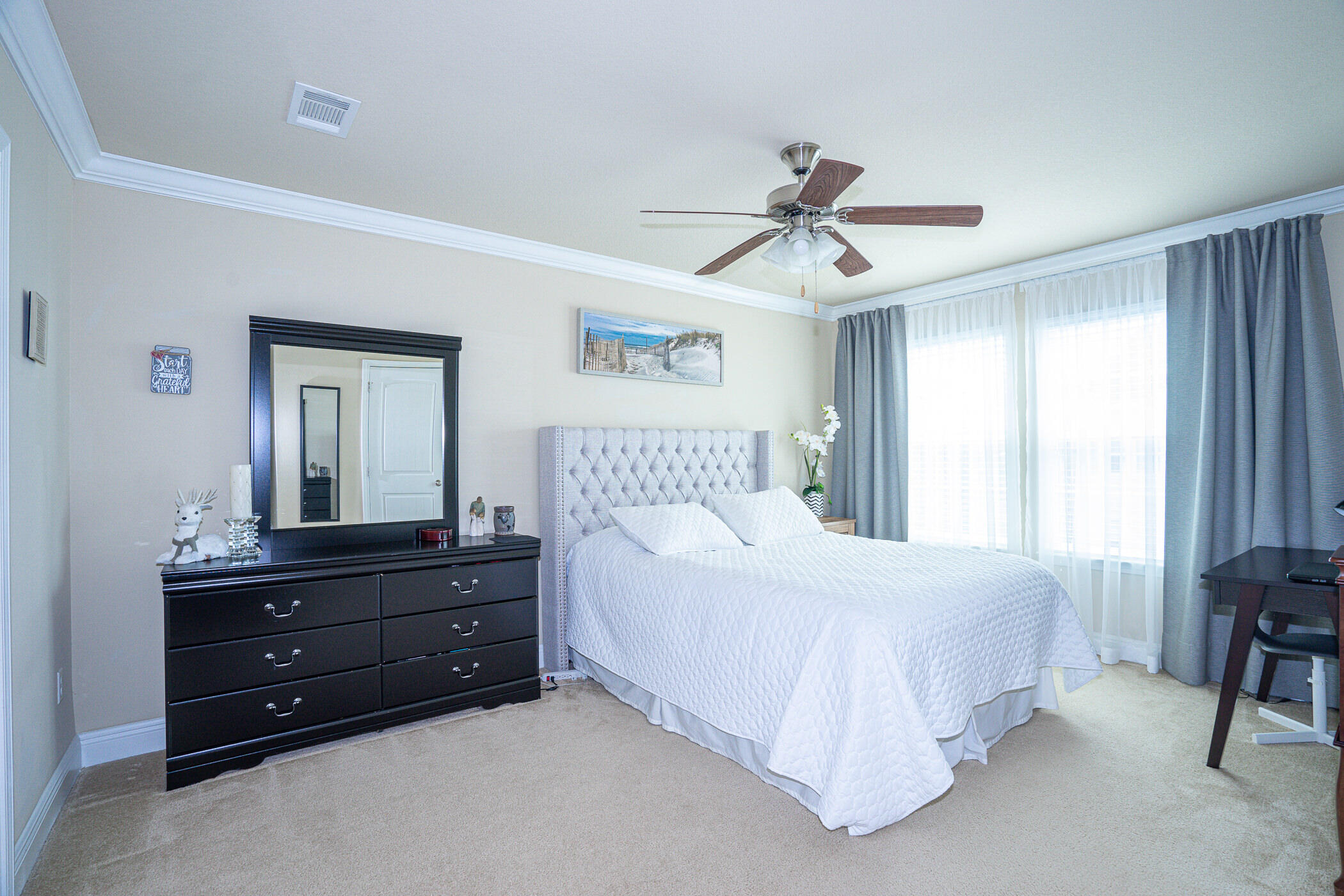 19 East Shady Oaks Lane, Unit B Santa Rosa Beach, FL 32459 - Photo 18 of 35 a bedroom with a bed and window