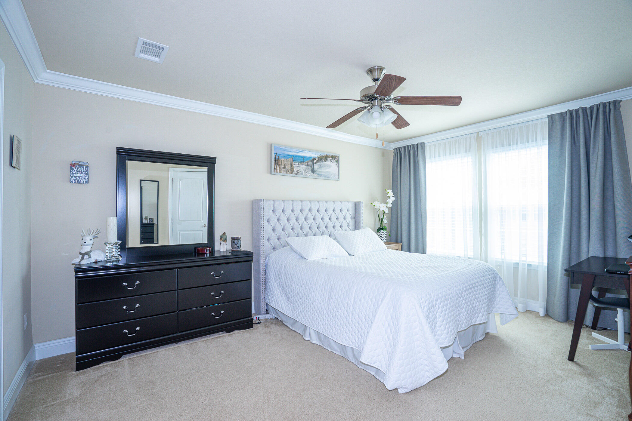 19 East Shady Oaks Lane, Unit B Santa Rosa Beach, FL 32459 - Photo 19 of 35 a bedroom with a bed and window