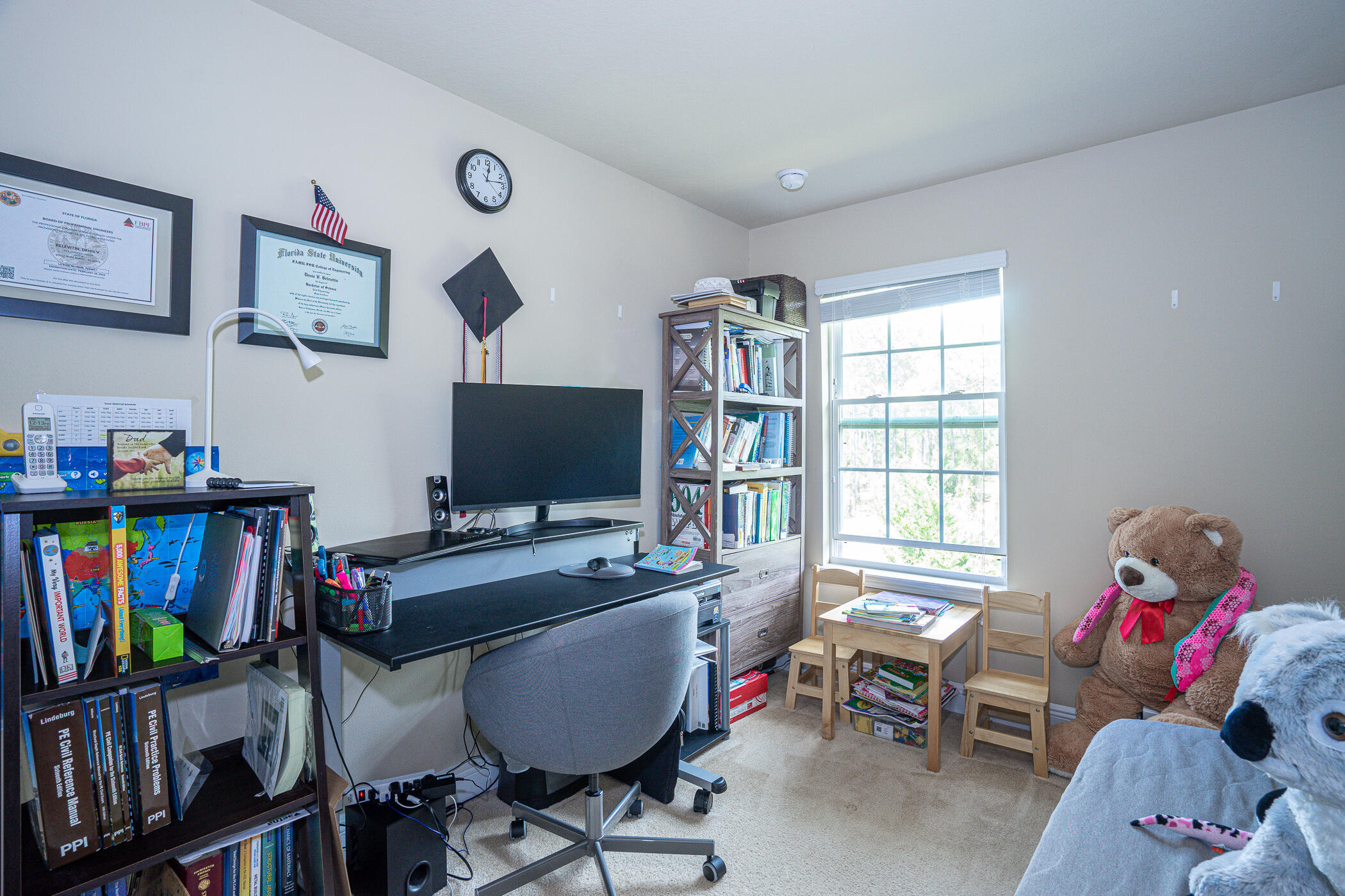 19 East Shady Oaks Lane, Unit B Santa Rosa Beach, FL 32459 - Photo 29 of 35 a workspace with furniture hardwood and a window