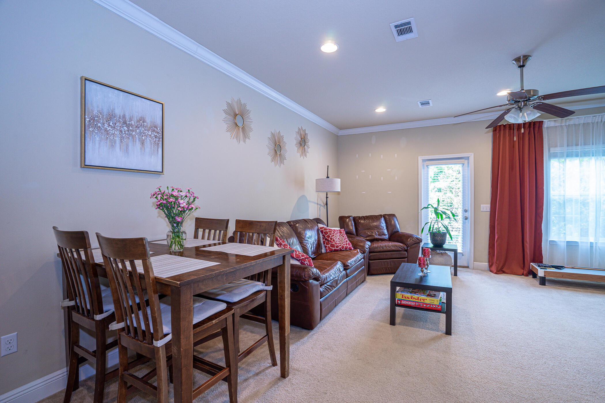 19 East Shady Oaks Lane, Unit B Santa Rosa Beach, FL 32459 - Photo 9 of 35 a dining room with furniture and window