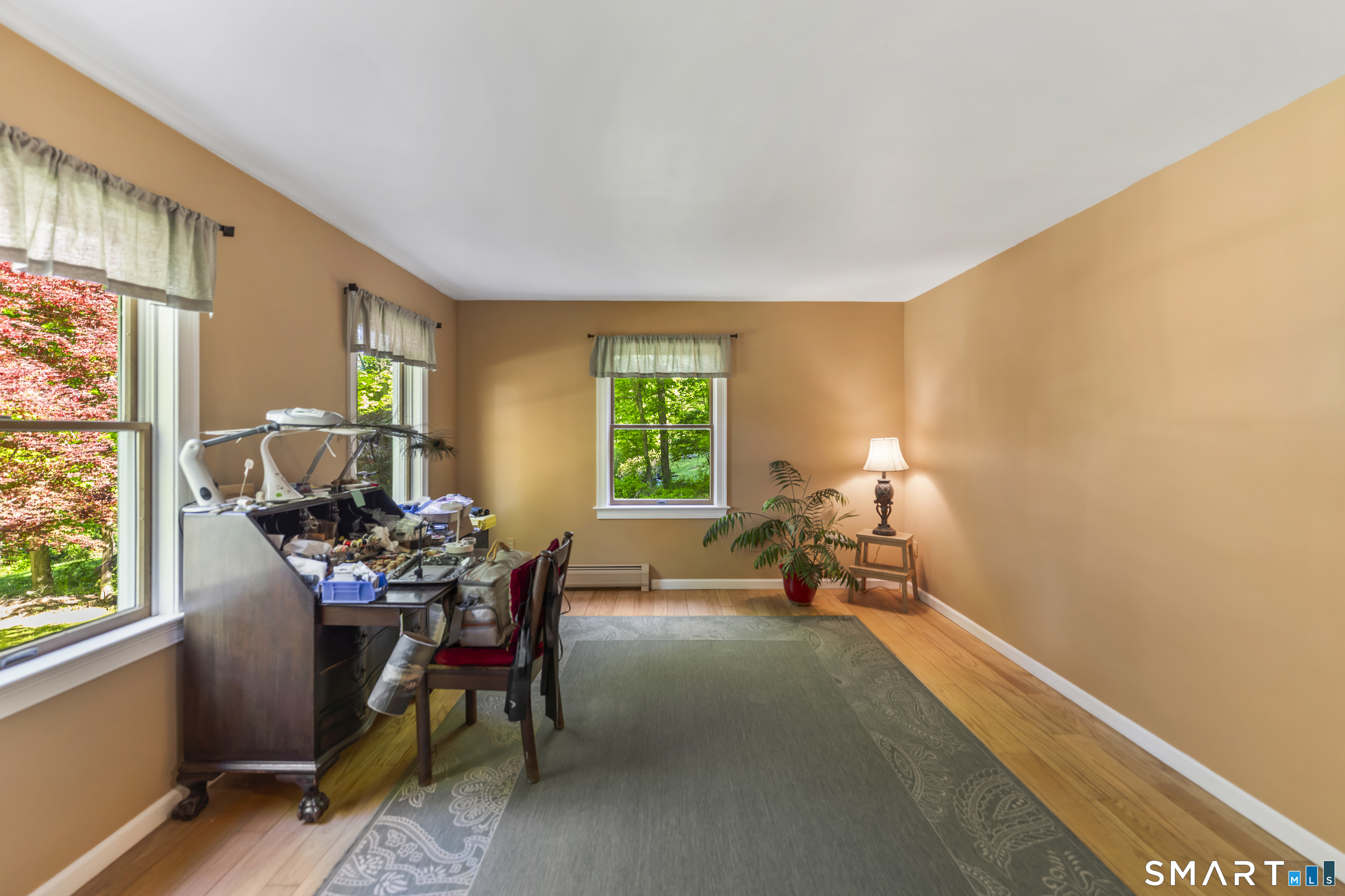 18 Gelding Hill Road Newtown, CT 06482 - Photo 13 of 40 a living room with furniture and a window