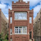 a front view of a multi story residential apartment building
